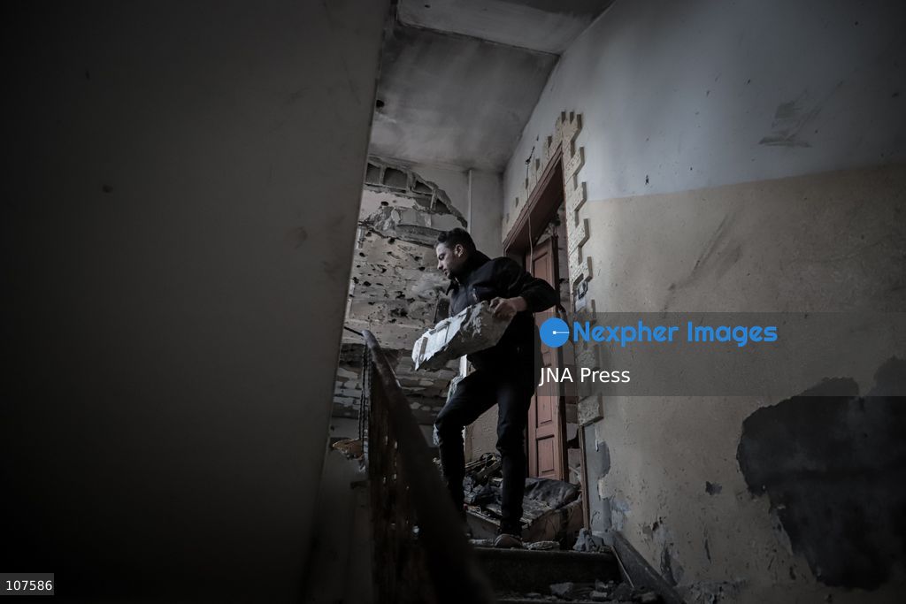 GAZA CITY, PALESTINE, OCTOBER 20, 2026: Palestinians inspect damage to a residential apartment following an Israeli airstrike in the Rimal neighbourhood of Gaza City. The early-morning strike killed Akram Yassin and his wife, according to medical sources. Skaik / JNA Press. (Photo by Mohammed M Skaik/JNA Press via Nexpher Images)