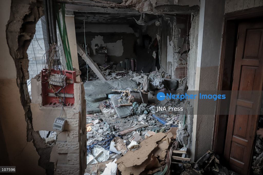 GAZA CITY, PALESTINE, OCTOBER 20, 2026: Palestinians inspect damage to a residential apartment following an Israeli airstrike in the Rimal neighbourhood of Gaza City. The early-morning strike killed Akram Yassin and his wife, according to medical sources. Skaik / JNA Press. (Photo by Mohammed M Skaik/JNA Press via Nexpher Images)