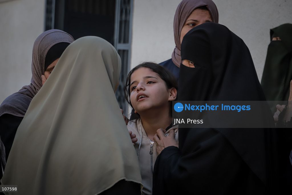GAZA CITY, PALESTINE, OCTOBER 20, 2026: Dima Yassin, 10, bids farewell to her parents after they were killed in an Israeli airstrike on their residential apartment in western Gaza City earlier in the day. Skaik / JNA Press. (Photo by Mohammed M Skaik/JNA Press via Nexpher Images)