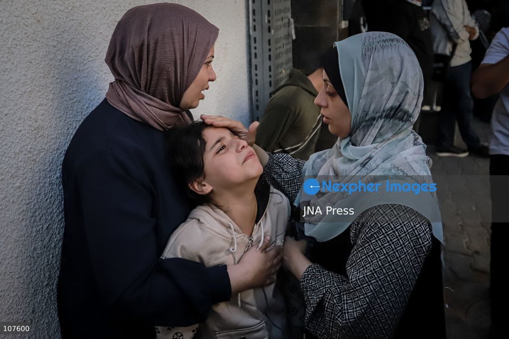 GAZA CITY, PALESTINE, OCTOBER 20, 2026: Dima Yassin, 10, bids farewell to her parents after they were killed in an Israeli airstrike on their residential apartment in western Gaza City earlier in the day. Skaik / JNA Press. (Photo by Mohammed M Skaik/JNA Press via Nexpher Images)