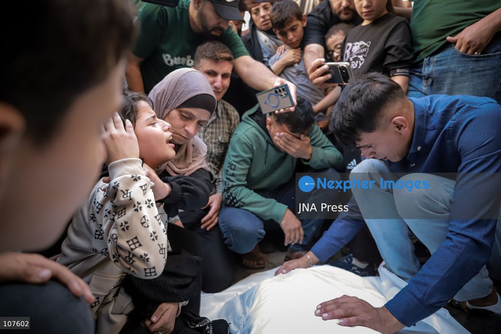 GAZA CITY, PALESTINE, OCTOBER 20, 2026: Dima Yassin, 10, bids farewell to her parents after they were killed in an Israeli airstrike on their residential apartment in western Gaza City earlier in the day. Skaik / JNA Press. (Photo by Mohammed M Skaik/JNA Press via Nexpher Images)