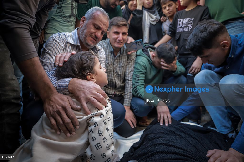 GAZA, PALESTINE - OCTOBER 20, 2026: Dima Yassin, 10, bids farewell to her parents, who were killed in an Israeli airstrike that targeted their residential apartment in western Gaza City. Skaik / JNA PRESS (Photo by Mohammed M Skaik/JNA Press via Nexpher Images)