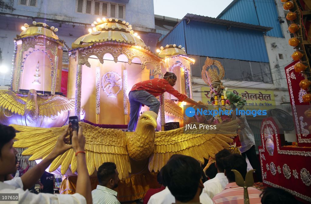 PRAYAGRAJ, INDIA - OCTOBER 20, 2026: Artists dressed as Hindu deities Rama and Lakshman sit in a tableau during a Dussehra festival procession. (Photo by Jitendra Prakash/JNA Press via Nexpher Images)