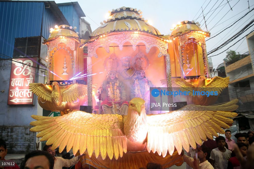 PRAYAGRAJ, INDIA - OCTOBER 20, 2026: Artists dressed as Hindu deities Rama and Lakshman sit in a tableau during a Dussehra festival procession. (Photo by Jitendra Prakash/JNA Press via Nexpher Images)