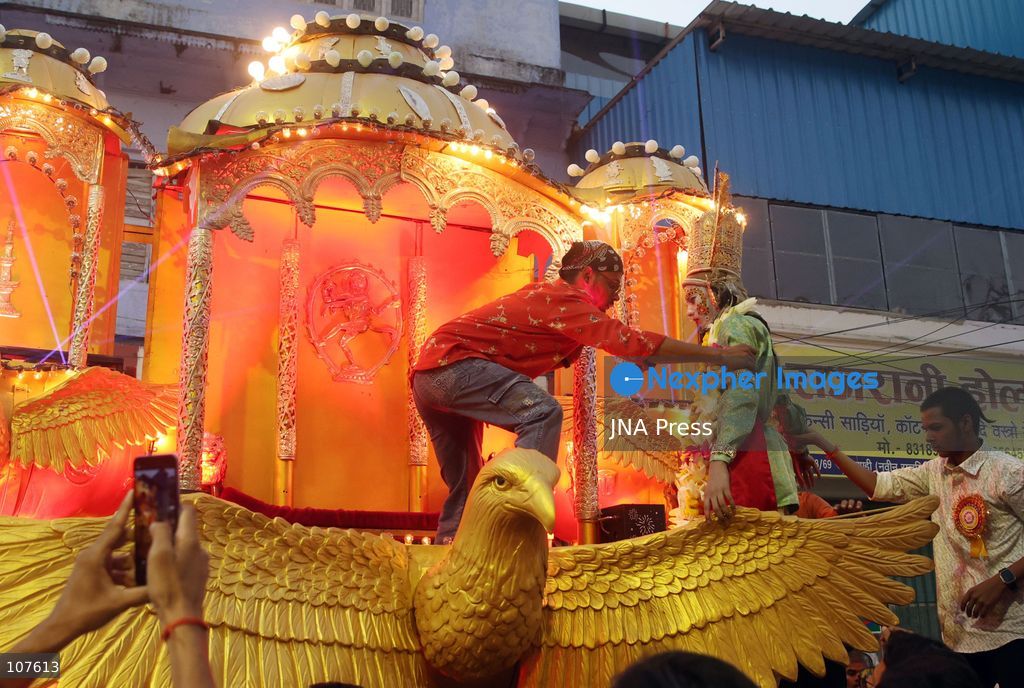 PRAYAGRAJ, INDIA - OCTOBER 20, 2026: Artists dressed as Hindu deities Rama and Lakshman sit in a tableau during a Dussehra festival procession. (Photo by Jitendra Prakash/JNA Press via Nexpher Images)