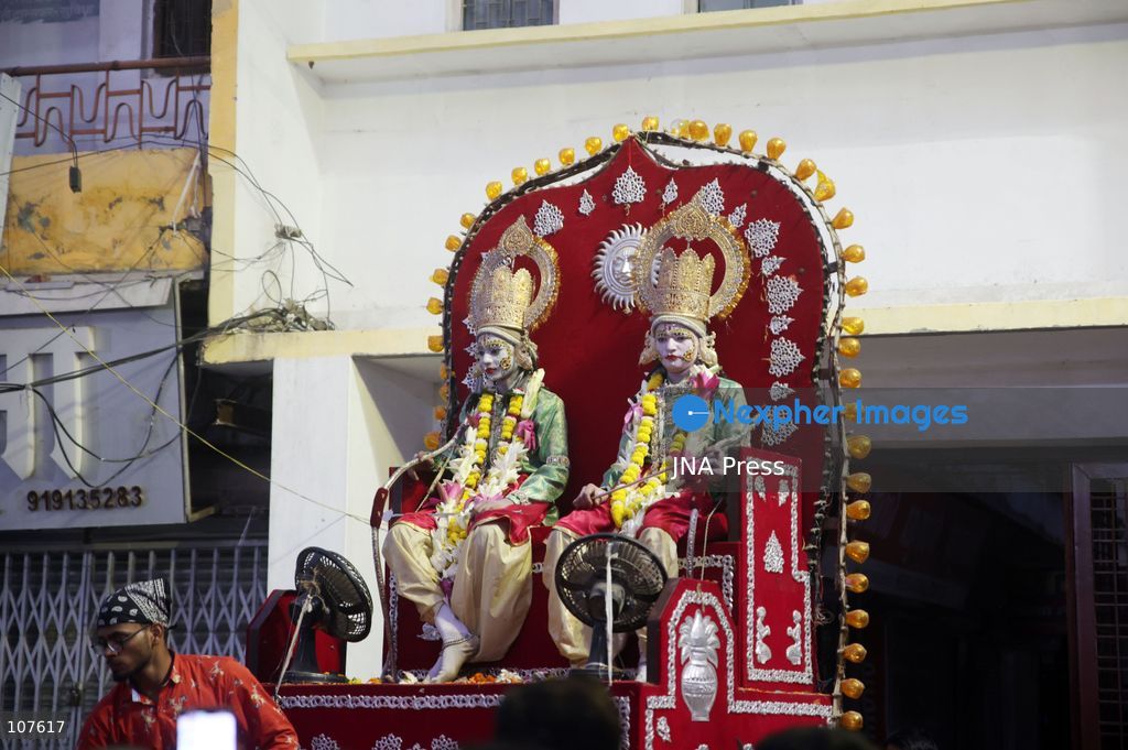 PRAYAGRAJ, INDIA - OCTOBER 20, 2026: Artists dressed as Hindu deities Rama and Lakshman sit in a tableau during a Dussehra festival procession. (Photo by Jitendra Prakash/JNA Press via Nexpher Images)
