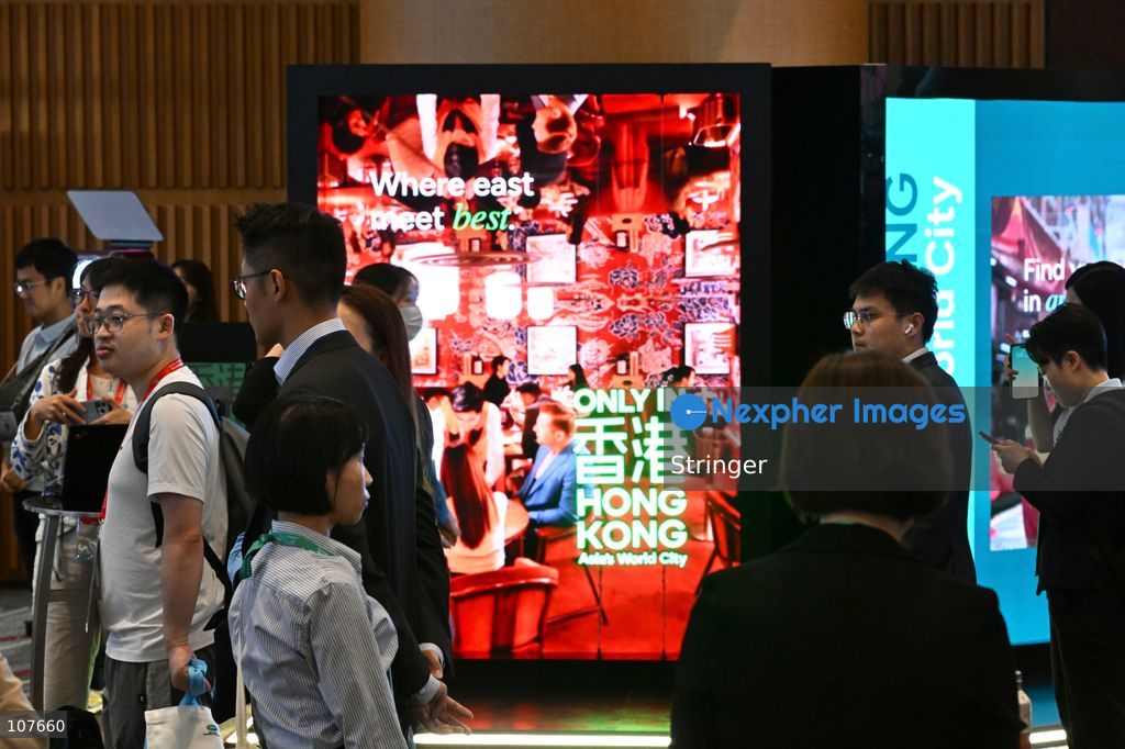 Participants watching an exhibition during of APEC Finance Ministers' Meeting on October 20, 2026 in Hong Kong. (Photo by Stringer/Nexpher Images)