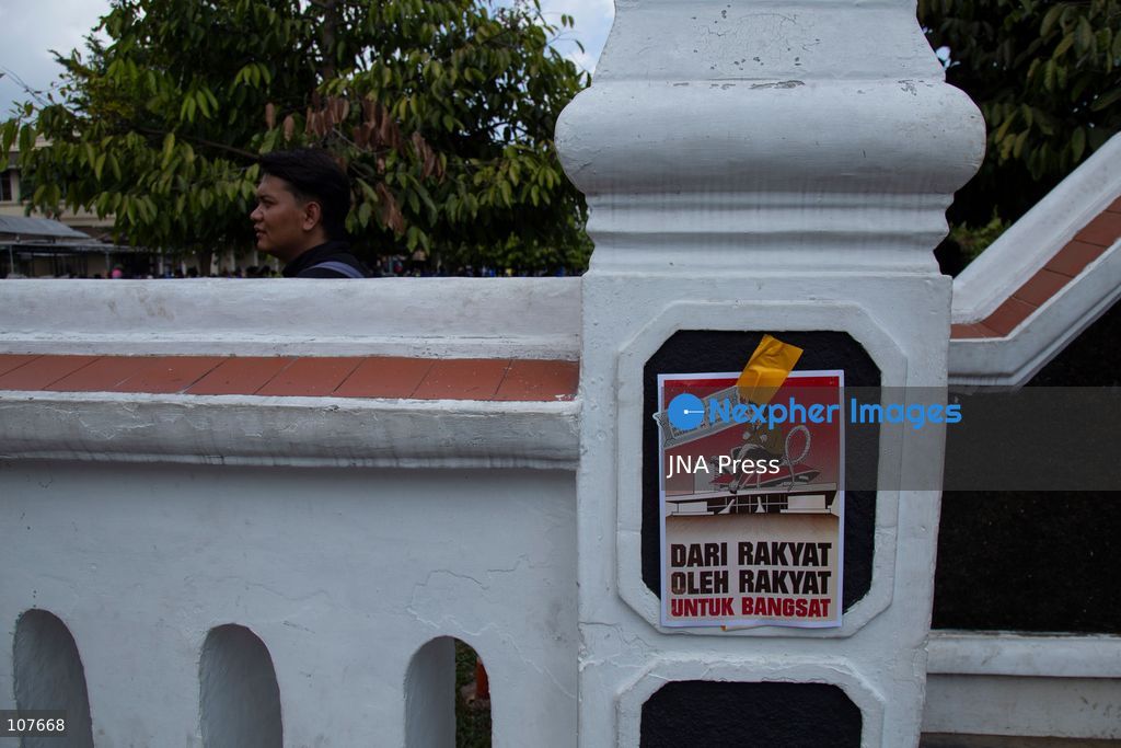 YOGYAKARTA, INDONESIA - OCTOBER 20, 2026: Students gather at the Special Region of Yogyakarta (DIY) Regional People's Representative Council (DPRD) building during a protest against the central government, which has been in office for two years. Students from Muhammadiyah University of Yogyakarta (UMY) later marched to the Zero Kilometer Point in Yogyakarta to voice criticism of government policies they consider controversial and harmful to people's lives. (Photo by Topen Anggara Saputra/JNA Press via Nexpher Images)