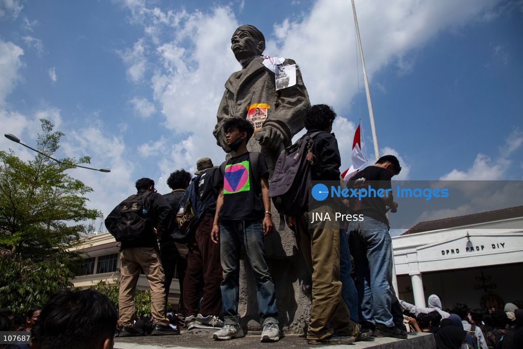YOGYAKARTA, INDONESIA - OCTOBER 20, 2026: Students gather at the Special Region of Yogyakarta (DIY) Regional People's Representative Council (DPRD) building during a protest against the central government, which has been in office for two years. Students from Muhammadiyah University of Yogyakarta (UMY) later marched to the Zero Kilometer Point in Yogyakarta to voice criticism of government policies they consider controversial and harmful to people's lives. (Photo by Topen Anggara Saputra/JNA Press via Nexpher Images)
