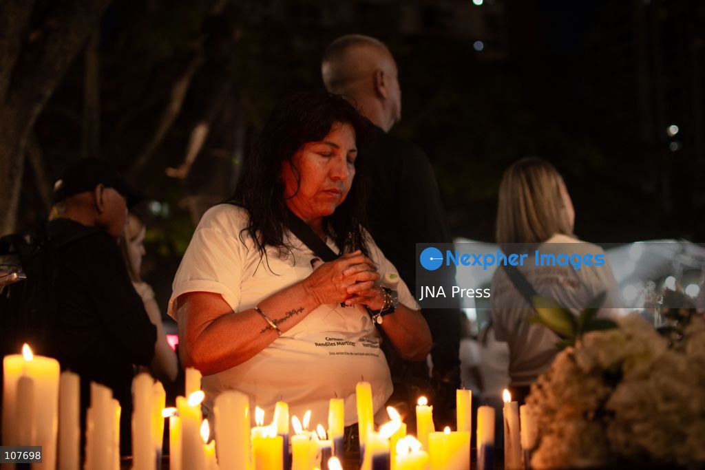 CARACAS, VENEZUELA - OCTOBER 19, 2026: Devotees light candles and pray during a spiritual procession around the church where the remains of Saint Jose Gregorio Hernandez, known as the 'Doctor of the Poor', rest, to mark the first anniversary of his canonization. Hernandez is Venezuela's first lay saint, and his popular devotion and social impact remain strong across the country. (Photo by Franyer Nieves (Babel)/JNA Press via Nexpher Images)