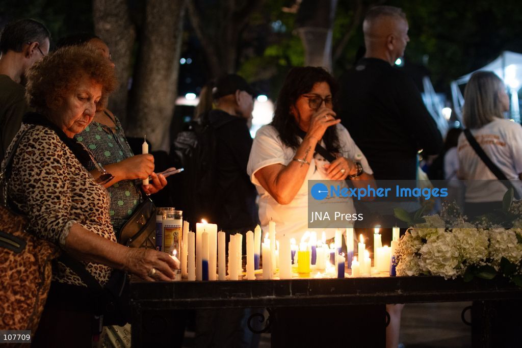 CARACAS, VENEZUELA - OCTOBER 19, 2026: Devotees light candles and pray during a spiritual procession around the church where the remains of Saint Jose Gregorio Hernandez, known as the 'Doctor of the Poor', rest, to mark the first anniversary of his canonization. Hernandez is Venezuela's first lay saint, and his popular devotion and social impact remain strong across the country. (Photo by Franyer Nieves (Babel)/JNA Press via Nexpher Images)