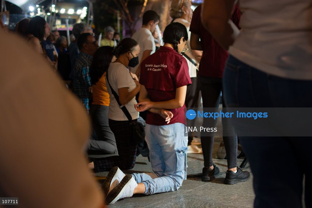 CARACAS, VENEZUELA - OCTOBER 19, 2026: Devotees light candles and pray during a spiritual procession around the church where the remains of Saint Jose Gregorio Hernandez, known as the 'Doctor of the Poor', rest, to mark the first anniversary of his canonization. Hernandez is Venezuela's first lay saint, and his popular devotion and social impact remain strong across the country. (Photo by Franyer Nieves (Babel)/JNA Press via Nexpher Images)