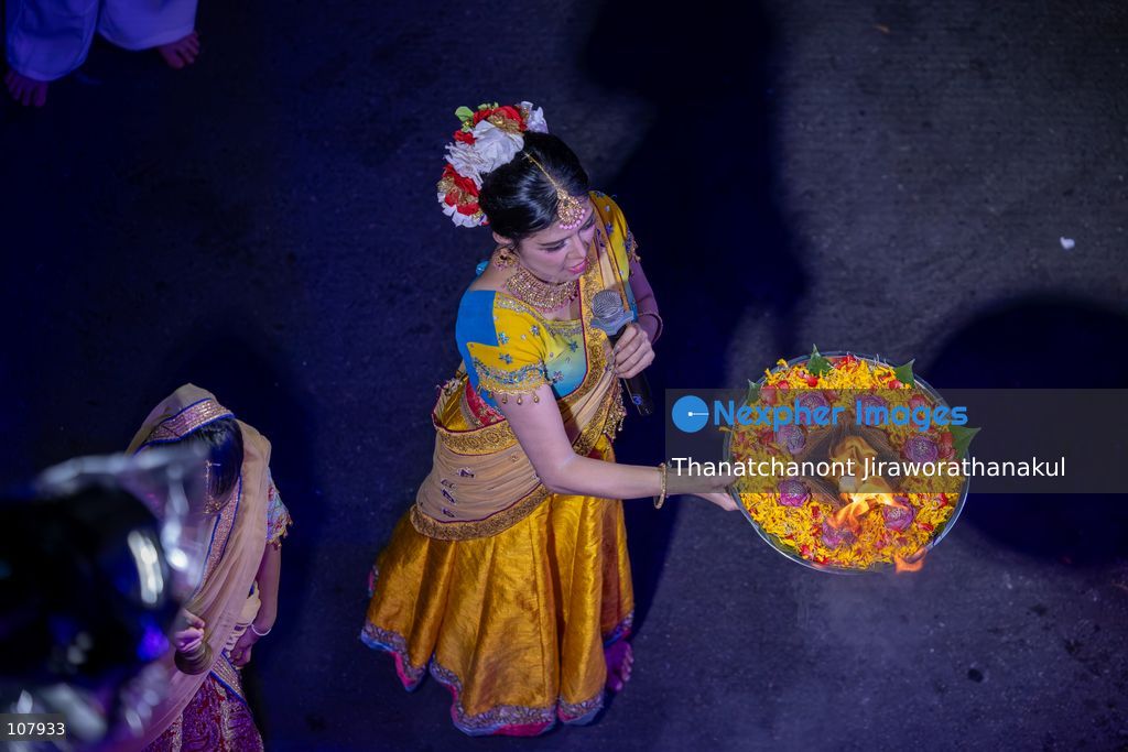BANGKOK, THAILAND — October 20, 2026: Hindu devotees and members of the public gather along Silom Road for the annual Navaratri procession at Sri Maha Mariamman Temple, widely known as Wat Khaek. The procession marking Vijayadashami features religious ceremonies and traditional displays, reflecting the Hindu community’s faith and cultural heritage in Thailand. (Photo by Thanatchanont Jiraworathanakul/Nexpher Images)