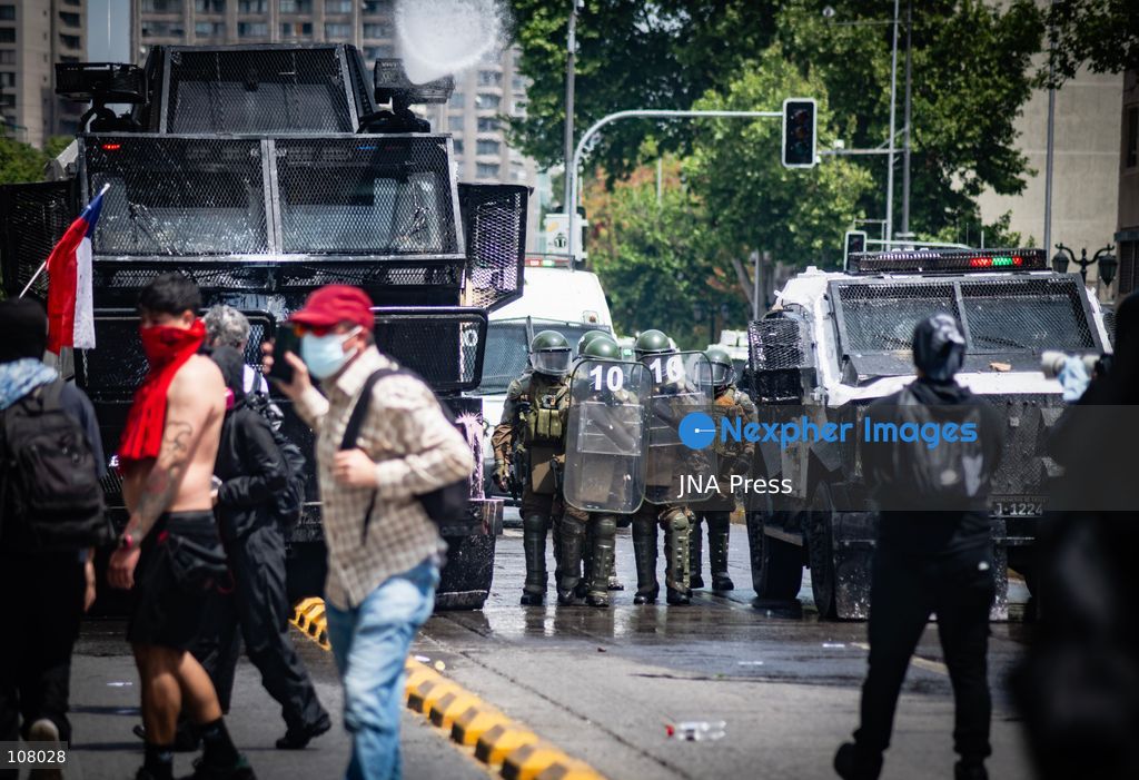 SANTIAGO, CHILE, OCTOBER 19, 2026: Demonstrators march in Santiago to mark the seventh anniversary of Chile’s 2019 social uprising, known as the “estallido social.” The movement began with protests against increased metro fares and developed into nationwide demonstrations over inequality, the cost of living and access to public services. (Photo by Mauro Arlegui/JNA Press via Nexpher Images)