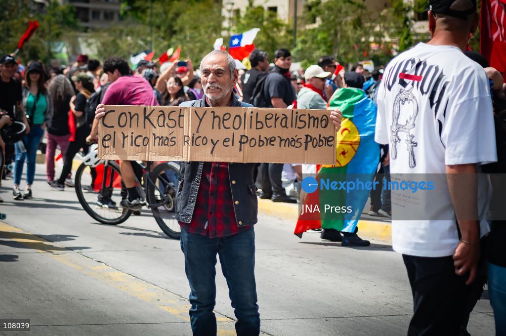 SANTIAGO, CHILE, OCTOBER 19, 2026: Demonstrators march in Santiago to mark the seventh anniversary of Chile’s 2019 social uprising, known as the “estallido social.” The movement began with protests against increased metro fares and developed into nationwide demonstrations over inequality, the cost of living and access to public services. (Photo by Mauro Arlegui/JNA Press via Nexpher Images)
