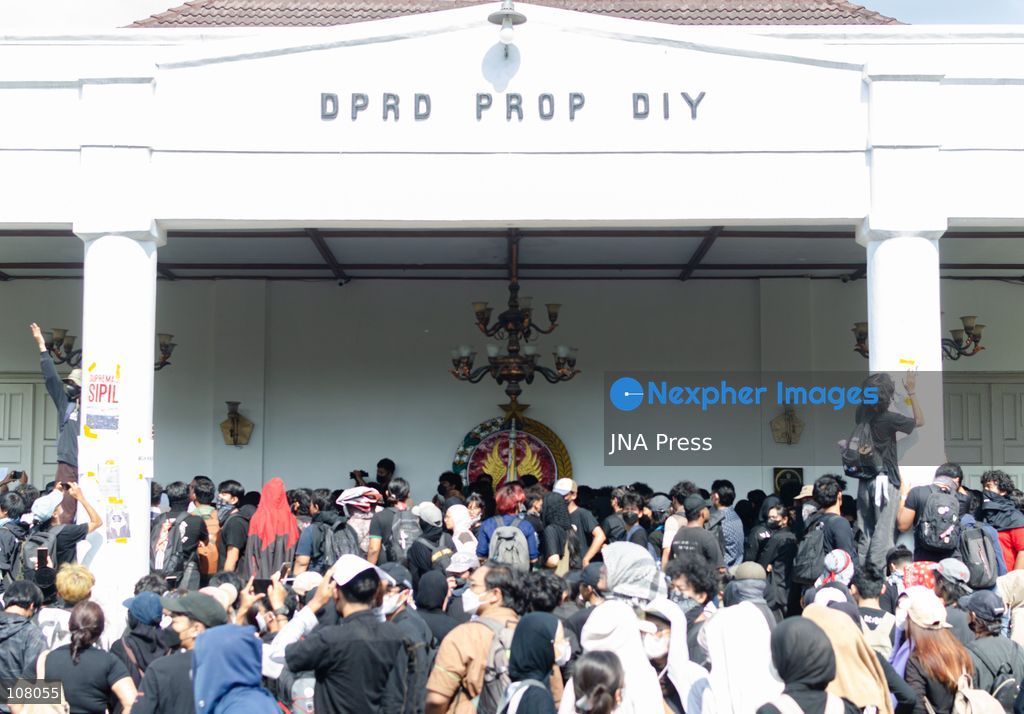 YOGYAKARTA, INDONESIA, OCTOBER 20, 2026: University students and activists hold banners and flags during a demonstration outside the Regional People's Representative Council (DPRD) building in Yogyakarta. The rally marks two years of President Prabowo Subianto and Vice President Gibran Rakabuming Raka’s administration, with protesters calling for policy reforms and greater government accountability. (Photo by Messa Adi Saputra/JNA Press via Nexpher Images)