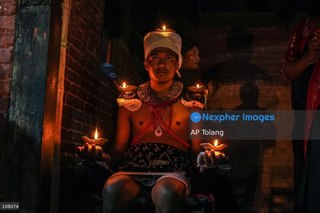 BHAKTAPUR, NEPAL – October 21, 2026: Hindu devotees perform a religious ritual by lighting oil lamps on their bodies at the premises of Brahmayani Temple during the Dashain festival in Bhaktapur, Nepal. marking Vijaya Dashami, the tenth day of Dashain, Nepal’s biggest Hindu festival. Photo by Ambir Tolang/JNA Press (Photo by AP Tolang/Nexpher Images)