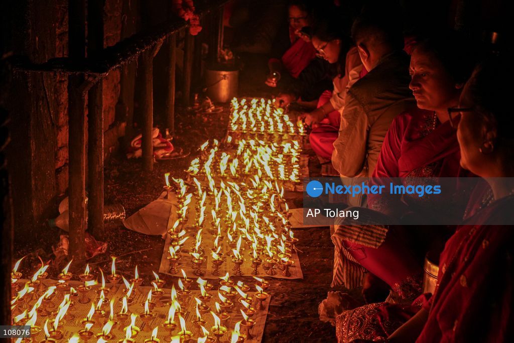 BH​​AKTAPUR, NEPAL – October 21, 2026: Hindu devotees perform a religious ritual by lighting oil lamps at the premises of Brahmayani Temple in Bhaktapur, Nepal. marking Vijaya Dashami, the tenth day of Dashain, Nepal’s biggest Hindu festival. Photo by Ambir Tolang/JNA Press (Photo by AP Tolang/Nexpher Images)