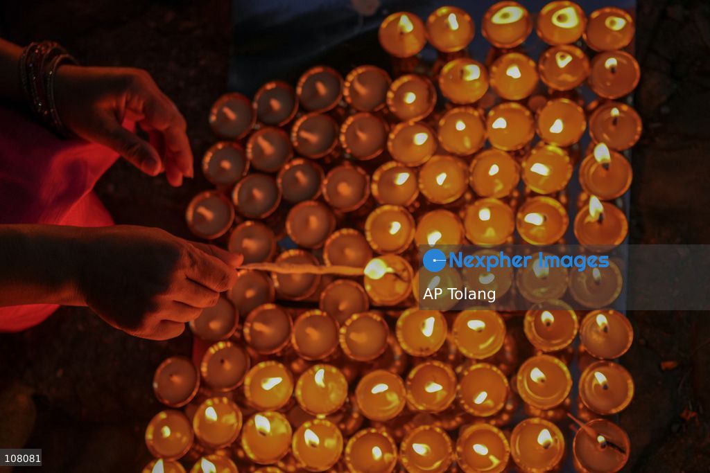 BH​​AKTAPUR, NEPAL – October 21, 2026: Hindu devotees perform a religious ritual by lighting oil lamps at the premises of Brahmayani Temple in Bhaktapur, Nepal. marking Vijaya Dashami, the tenth day of Dashain, Nepal’s biggest Hindu festival. Photo by Ambir Tolang/JNA Press (Photo by AP Tolang/Nexpher Images)