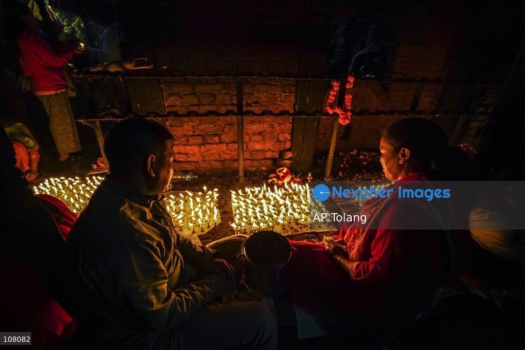 BHAKTAPUR, NEPAL – October 21, 2026: Hindu devotees perform a religious ritual by lighting oil lamps at the premises of Brahmayani Temple in Bhaktapur, Nepal. marking Vijaya Dashami, the tenth day of Dashain, Nepal’s biggest Hindu festival. Photo by Ambir Tolang/JNA Press (Photo by AP Tolang/Nexpher Images)