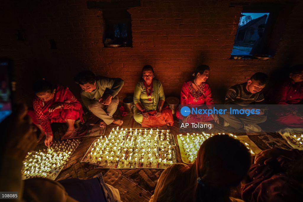 BHAKTAPUR, NEPAL – October 21, 2026: Hindu devotees perform a religious ritual by lighting oil lamps at the premises of Brahmayani Temple in Bhaktapur, Nepal. marking Vijaya Dashami, the tenth day of Dashain, Nepal’s biggest Hindu festival. Photo by Ambir Tolang/JNA Press (Photo by AP Tolang/Nexpher Images)