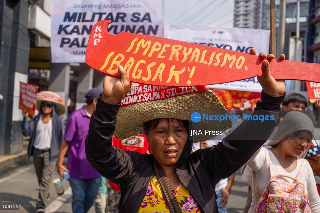 MANILA, PHILIPPINES - OCTOBER 21, 2026: Farmers and agricultural workers march toward the Mendiola Peace Arch, near the presidential palace, to call for agrarian reform during Peasant Month, observed every October in the Philippines. Protesters, including farmers from Central Luzon, are asking the government for aid as they face the effects of climate change and rising food demand. (Photo by Charles Edmon S. Perez/JNA Press via Nexpher Images)