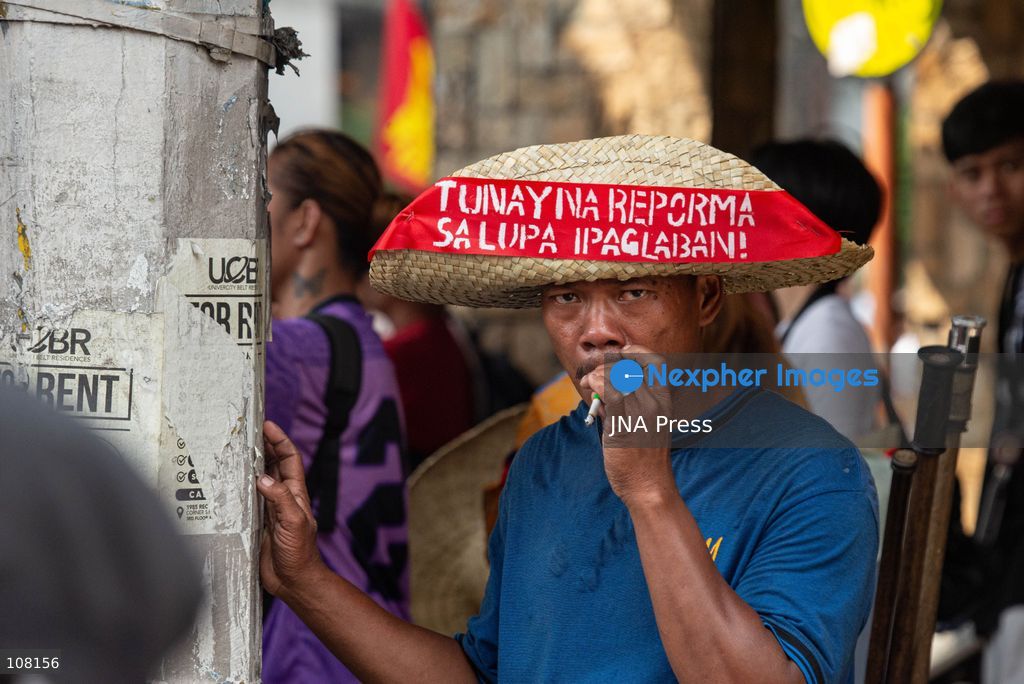 MANILA, PHILIPPINES - OCTOBER 21, 2026: Farmers and agricultural workers march toward the Mendiola Peace Arch, near the presidential palace, to call for agrarian reform during Peasant Month, observed every October in the Philippines. Protesters, including farmers from Central Luzon, are asking the government for aid as they face the effects of climate change and rising food demand. (Photo by Charles Edmon S. Perez/JNA Press via Nexpher Images)