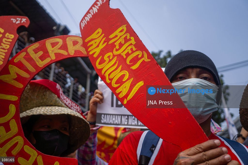 MANILA, PHILIPPINES - OCTOBER 21, 2026: Farmers and agricultural workers march toward the Mendiola Peace Arch, near the presidential palace, to call for agrarian reform during Peasant Month, observed every October in the Philippines. Protesters, including farmers from Central Luzon, are asking the government for aid as they face the effects of climate change and rising food demand. (Photo by Charles Edmon S. Perez/JNA Press via Nexpher Images)