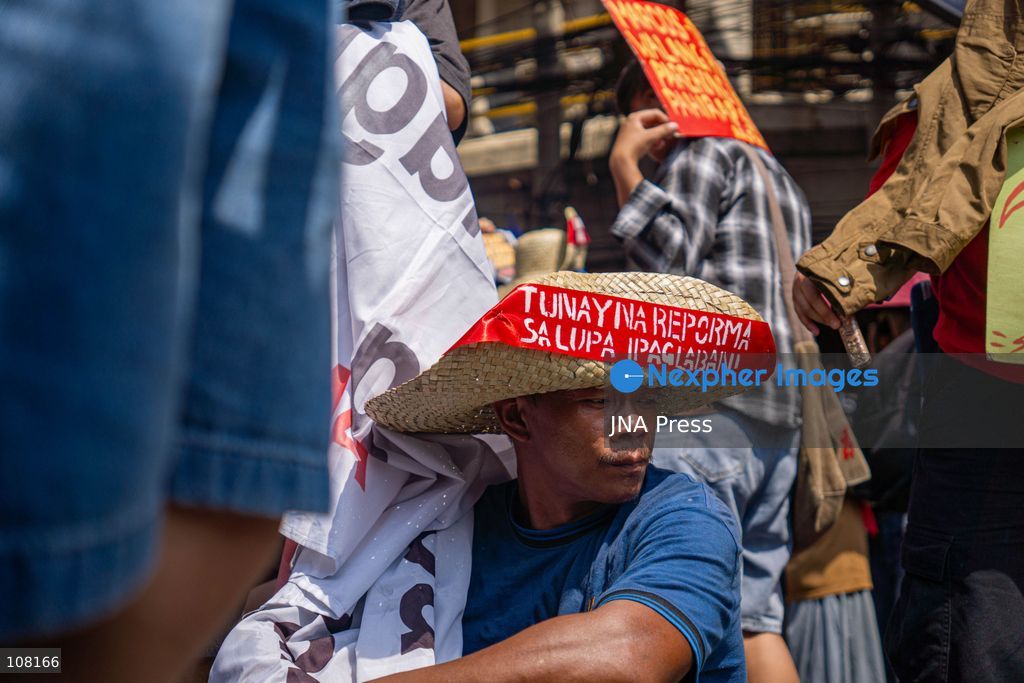 MANILA, PHILIPPINES - OCTOBER 21, 2026: Farmers and agricultural workers march toward the Mendiola Peace Arch, near the presidential palace, to call for agrarian reform during Peasant Month, observed every October in the Philippines. Protesters, including farmers from Central Luzon, are asking the government for aid as they face the effects of climate change and rising food demand. (Photo by Charles Edmon S. Perez/JNA Press via Nexpher Images)