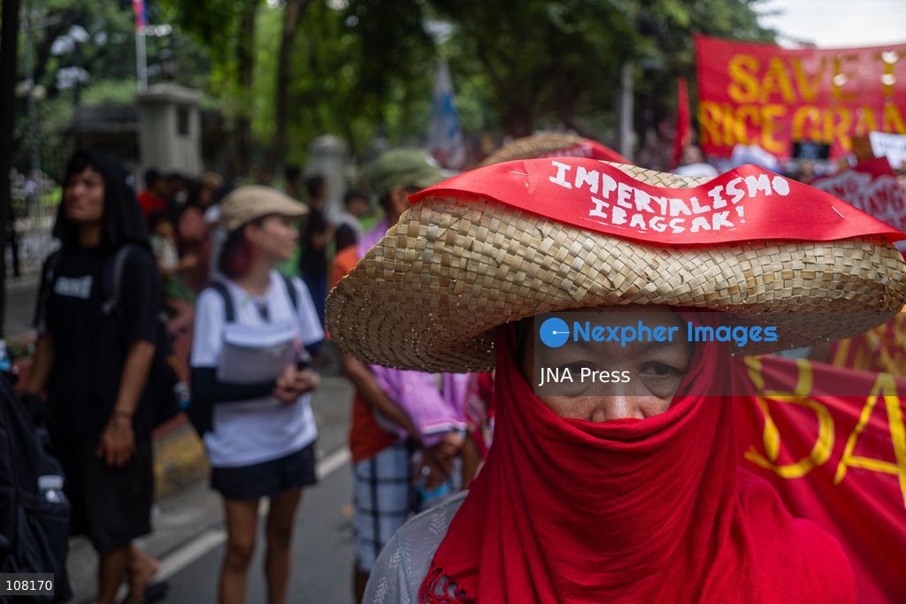 MANILA, PHILIPPINES - OCTOBER 21, 2026: Farmers and agricultural workers march toward the Mendiola Peace Arch, near the presidential palace, to call for agrarian reform during Peasant Month, observed every October in the Philippines. Protesters, including farmers from Central Luzon, are asking the government for aid as they face the effects of climate change and rising food demand. (Photo by Charles Edmon S. Perez/JNA Press via Nexpher Images)