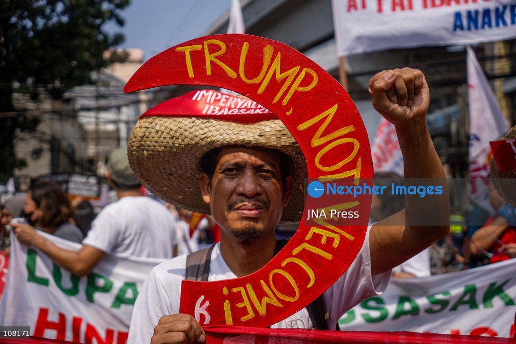 MANILA, PHILIPPINES - OCTOBER 21, 2026: Farmers and agricultural workers march toward the Mendiola Peace Arch, near the presidential palace, to call for agrarian reform during Peasant Month, observed every October in the Philippines. Protesters, including farmers from Central Luzon, are asking the government for aid as they face the effects of climate change and rising food demand. (Photo by Charles Edmon S. Perez/JNA Press via Nexpher Images)