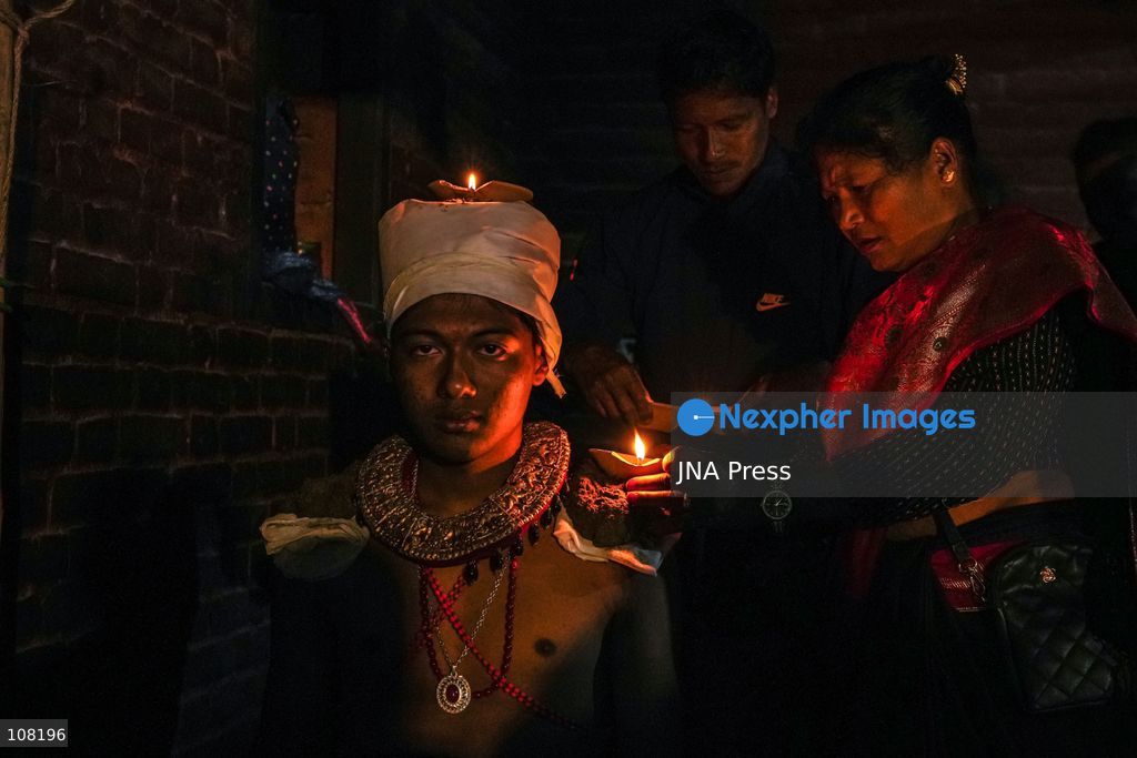 BHAKTAPUR, NEPAL - OCTOBER 21, 2026: Hindu devotees perform a religious ritual by lighting oil lamps on their bodies at Brahmayani Temple during the Dashain festival, marking Vijaya Dashami, the tenth day of Dashain, Nepal's biggest Hindu festival. (Photo by Ambir Tolang/JNA Press via Nexpher Images)