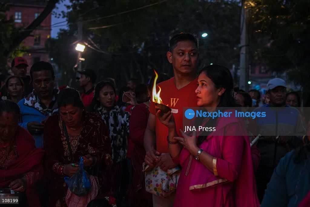 BHAKTAPUR, NEPAL - OCTOBER 21, 2026: Hindu devotees perform a religious ritual by lighting oil lamps on their bodies at Brahmayani Temple during the Dashain festival, marking Vijaya Dashami, the tenth day of Dashain, Nepal's biggest Hindu festival. (Photo by Ambir Tolang/JNA Press via Nexpher Images)