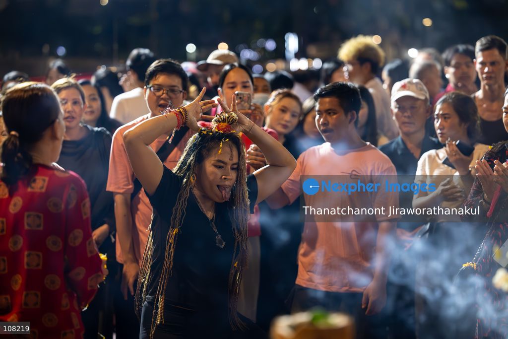TOP PICS - BANGKOK, THAILAND — October 20, 2026: Hindu devotees and members of the public gather along Silom Road for the annual Navaratri procession at Sri Maha Mariamman Temple, widely known as Wat Khaek. The procession marking Vijayadashami features religious ceremonies and traditional displays, reflecting the Hindu community’s faith and cultural heritage in Thailand. (Photo by Thanatchanont Jiraworathanakul/Nexpher Images)