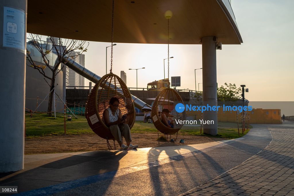 People resting on chairs at a park on October 21, 2026 in Hong Kong. (Photo by Vernon Yuen/Nexpher Images)