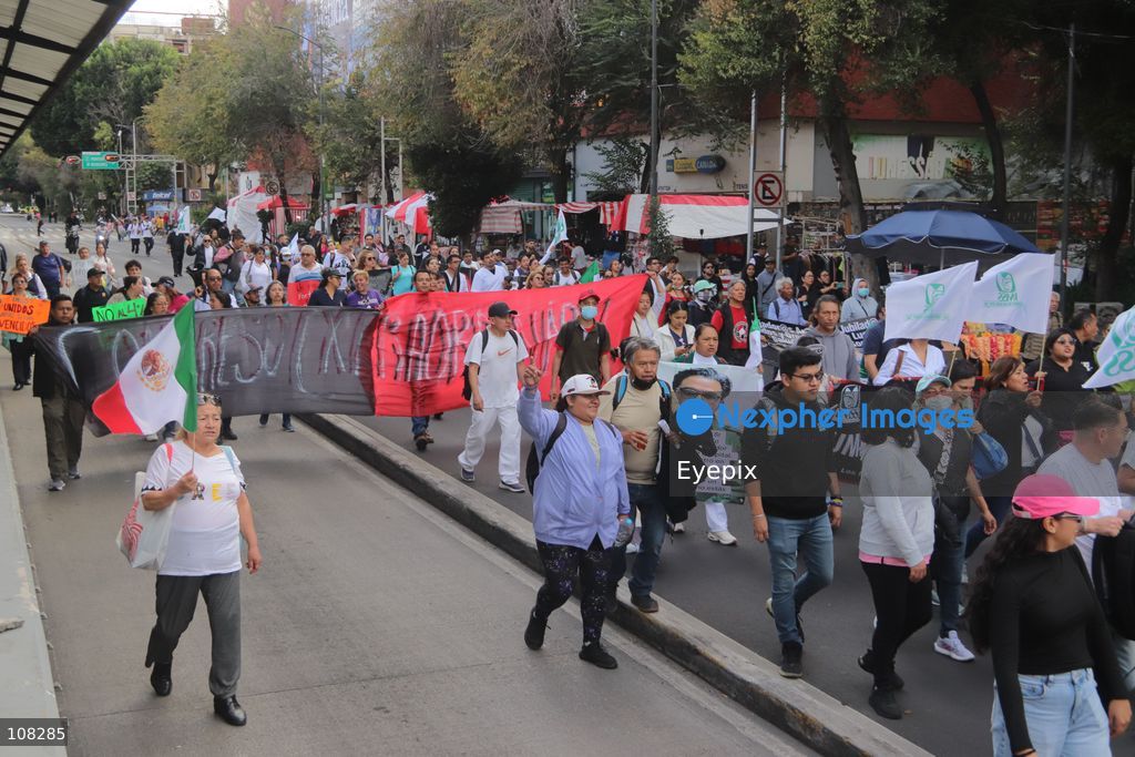 Healthcare workers belonging to the Mexican Social Security Institute (IMSS) protest to demand a direct pay raise based on the pay scale, a comprehensive supply of medical equipment and supplies, and the resignation of the General Secretary of the National Union of Social Security Workers (SNTSS). on October 21, 2026 in Mexico City, Mexico. (Photo by Carlos Santiago / Eyepix Group/Eyepix via Nexpher Images)