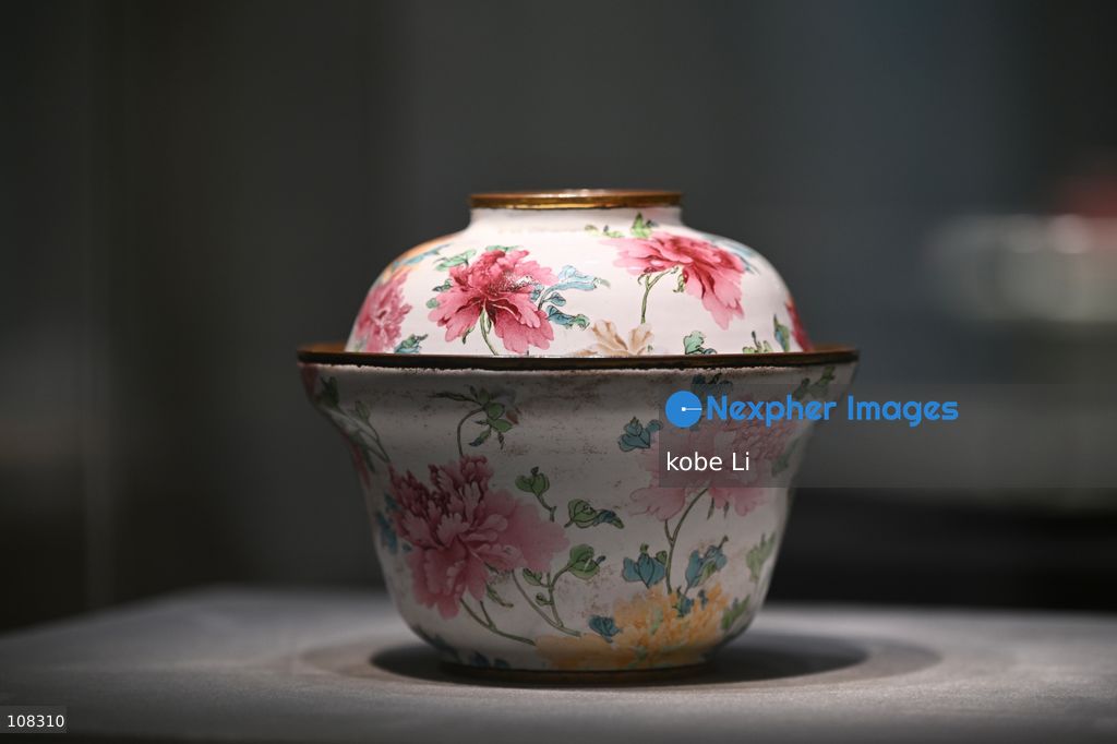 A painted enamel peony' bowland cover qing dynasty, displaying at Christie's Asia Pacific Headquarters on October 22, 2026 in Hong Kong. (Photo by kobe Li/Nexpher Images)