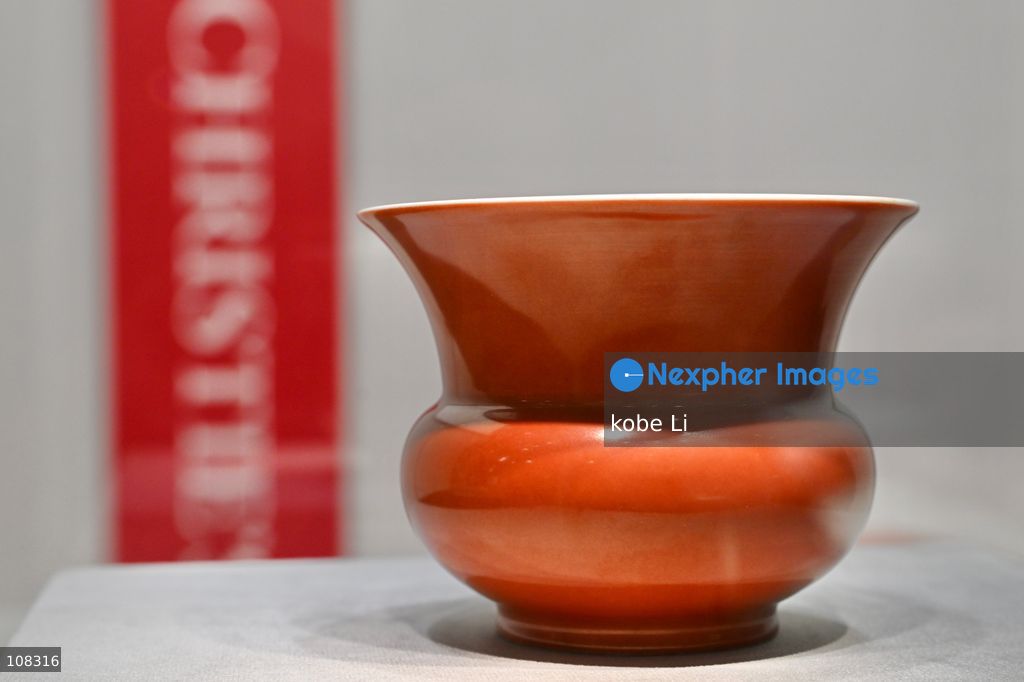 A coral-red enamelled leys jar, zhadou zhengde six-character mark in underglaze blue within a double circle and of the period (1506-1521), displaying at Christie's Asia Pacific Headquarters on October 22, 2026 in Hong Kong. (Photo by kobe Li/Nexpher Images)