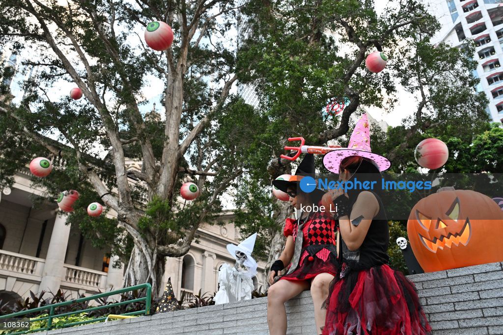 People cosplay and posing photo with Halloween decorations at Central on October 22, 2026 in Hong Kong. (Photo by kobe Li/Nexpher Images)