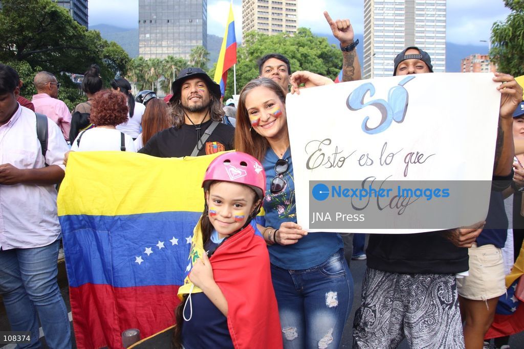 CARACAS, VENEZUELA, OCTOBER 22, 2026: Opposition supporters demonstrate in Caracas to demand a timetable for presidential elections and the safe return of opposition leader Maria Corina Machado to Venezuela. The rally forms part of nationwide mobilisations called by her Vente Venezuela movement, also demanding the release of political prisoners. (Photo by Moisés Quintero/JNA Press via Nexpher Images)