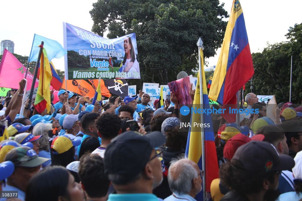 CARACAS, VENEZUELA, OCTOBER 22, 2026: Opposition supporters demonstrate in Caracas to demand a timetable for presidential elections and the safe return of opposition leader Maria Corina Machado to Venezuela. The rally forms part of nationwide mobilisations called by her Vente Venezuela movement, also demanding the release of political prisoners. (Photo by MoisÃ©s Quintero/JNA Press via Nexpher Images)