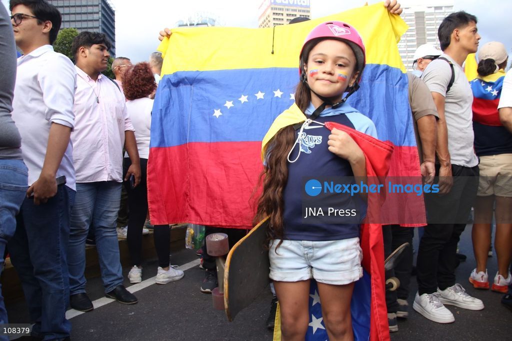 CARACAS, VENEZUELA, OCTOBER 22, 2026: Opposition supporters demonstrate in Caracas to demand a timetable for presidential elections and the safe return of opposition leader Maria Corina Machado to Venezuela. The rally forms part of nationwide mobilisations called by her Vente Venezuela movement, also demanding the release of political prisoners. (Photo by Moisés Quintero/JNA Press via Nexpher Images)