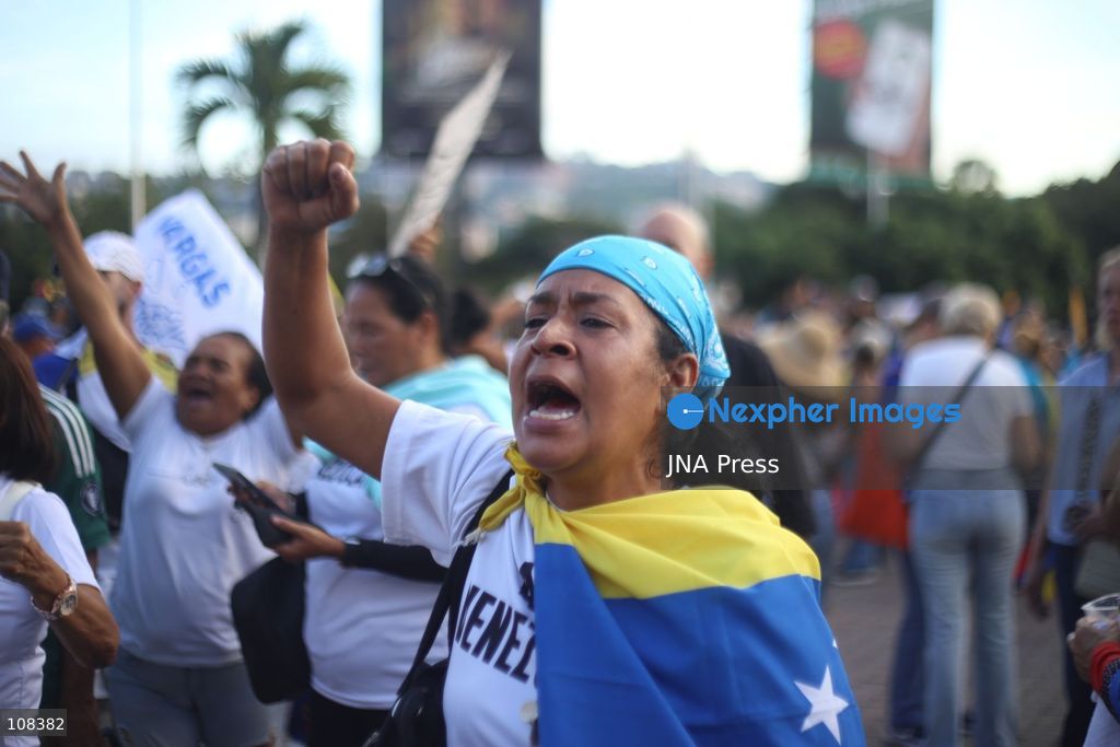 CARACAS, VENEZUELA, OCTOBER 22, 2026: Opposition supporters demonstrate in Caracas to demand a timetable for presidential elections and the safe return of opposition leader Maria Corina Machado to Venezuela. The rally forms part of nationwide mobilisations called by her Vente Venezuela movement, also demanding the release of political prisoners. (Photo by Moisés Quintero/JNA Press via Nexpher Images)