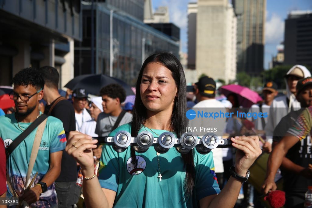 CARACAS, VENEZUELA, OCTOBER 22, 2026: Participants march in Caracas to mark Breast Cancer Awareness Month, also known as Pink Month. The mobilisation, called by the ruling United Socialist Party of Venezuela (PSUV), raises awareness of breast cancer and expresses support for people affected by the disease. (Photo by Moisés Quintero/JNA Press via Nexpher Images)