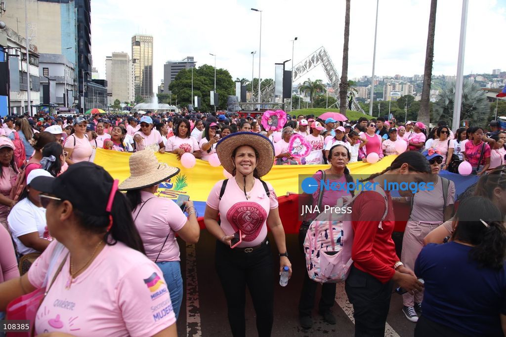 CARACAS, VENEZUELA, OCTOBER 22, 2026: Participants march in Caracas to mark Breast Cancer Awareness Month, also known as Pink Month. The mobilisation, called by the ruling United Socialist Party of Venezuela (PSUV), raises awareness of breast cancer and expresses support for people affected by the disease. (Photo by Moisés Quintero/JNA Press via Nexpher Images)
