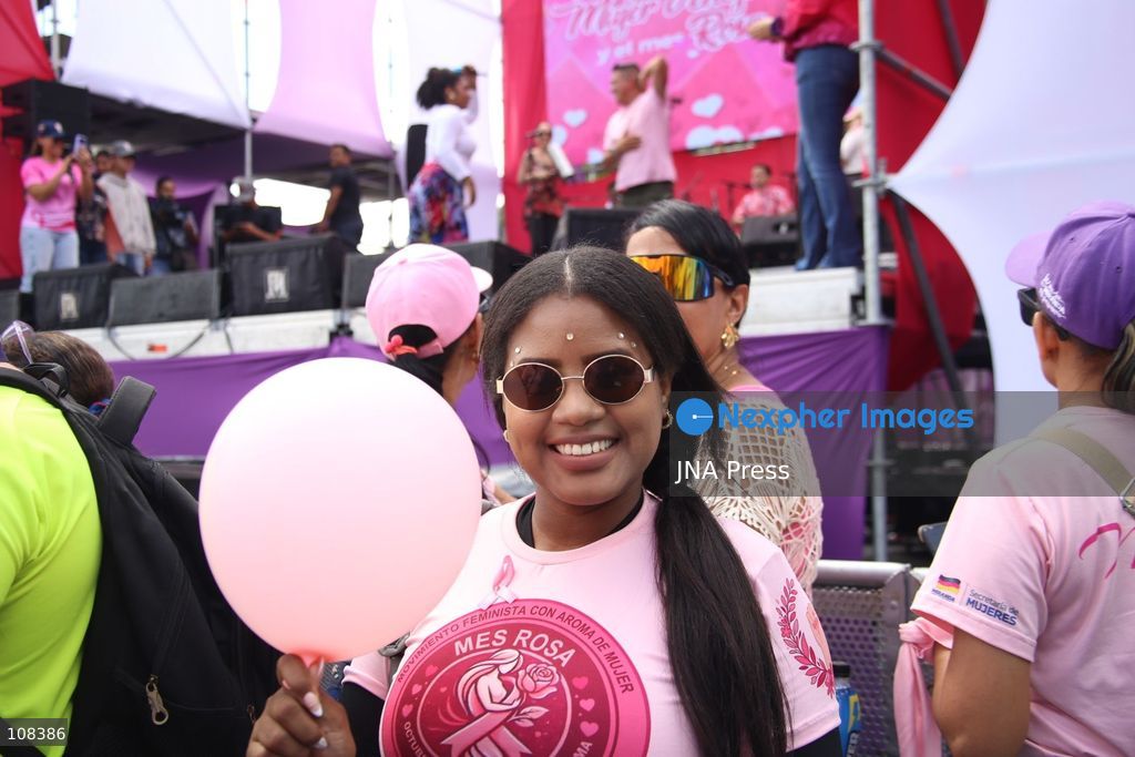 CARACAS, VENEZUELA, OCTOBER 22, 2026: Participants march in Caracas to mark Breast Cancer Awareness Month, also known as Pink Month. The mobilisation, called by the ruling United Socialist Party of Venezuela (PSUV), raises awareness of breast cancer and expresses support for people affected by the disease. (Photo by Moisés Quintero/JNA Press via Nexpher Images)