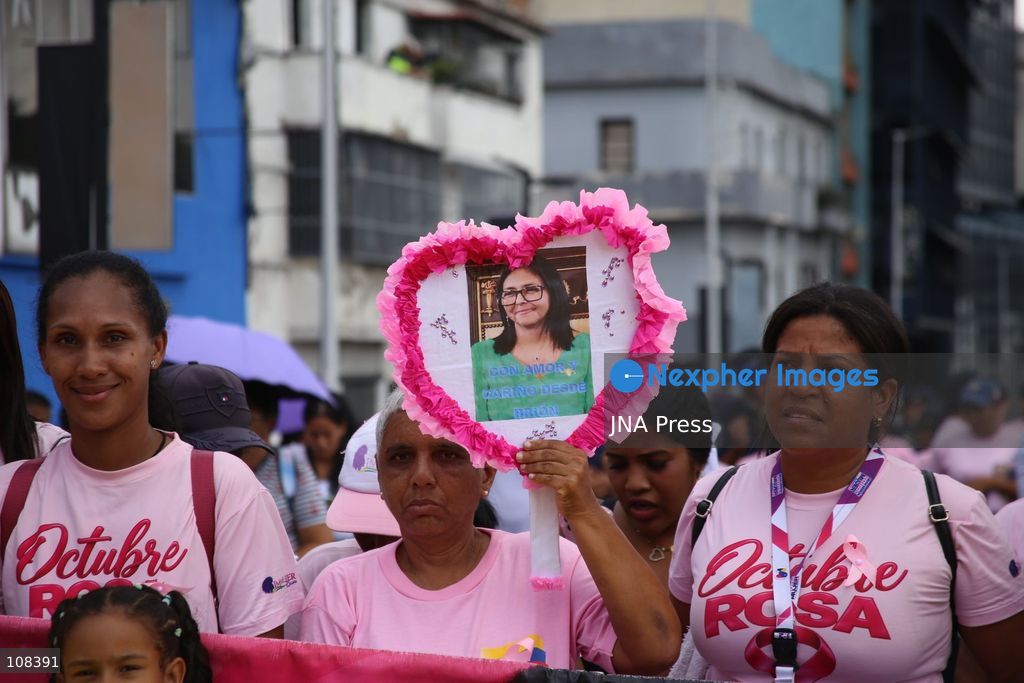 CARACAS, VENEZUELA, OCTOBER 22, 2026: Participants march in Caracas to mark Breast Cancer Awareness Month, also known as Pink Month. The mobilisation, called by the ruling United Socialist Party of Venezuela (PSUV), raises awareness of breast cancer and expresses support for people affected by the disease. (Photo by Moisés Quintero/JNA Press via Nexpher Images)