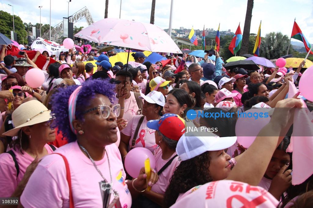 CARACAS, VENEZUELA, OCTOBER 22, 2026: Participants march in Caracas to mark Breast Cancer Awareness Month, also known as Pink Month. The mobilisation, called by the ruling United Socialist Party of Venezuela (PSUV), raises awareness of breast cancer and expresses support for people affected by the disease. (Photo by Moisés Quintero/JNA Press via Nexpher Images)