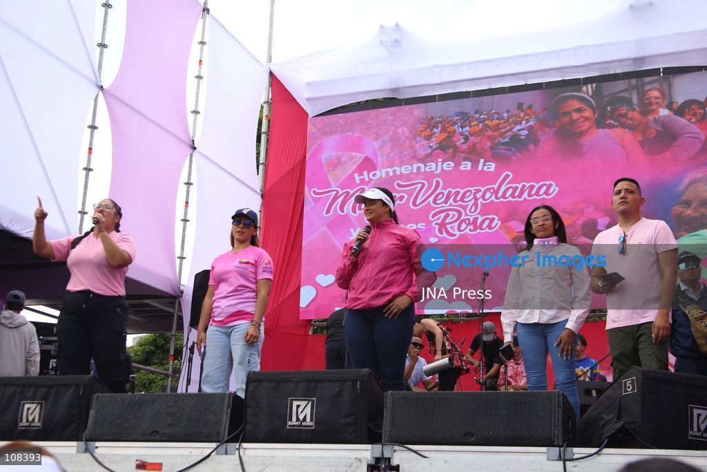 CARACAS, VENEZUELA, OCTOBER 22, 2026: Participants march in Caracas to mark Breast Cancer Awareness Month, also known as Pink Month. The mobilisation, called by the ruling United Socialist Party of Venezuela (PSUV), raises awareness of breast cancer and expresses support for people affected by the disease. (Photo by Moisés Quintero/JNA Press via Nexpher Images)