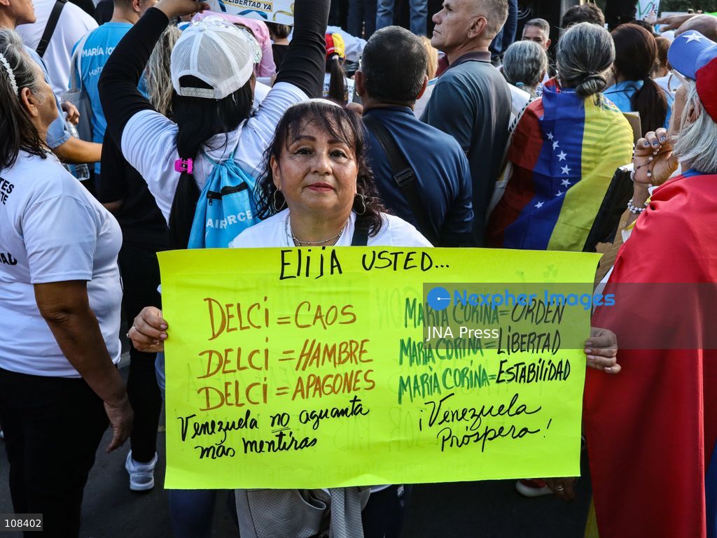 CARACAS, VENEZUELA, OCTOBER 22, 2026: Opposition supporters and leaders gather near Plaza Venezuela in Caracas to demand a timetable for presidential elections, the release of political prisoners and guarantees for opposition leader Maria Corina Machado’s safe return to the country. The demonstration forms part of nationwide mobilisations called by her Vente Venezuela movement. (Photo by Mario Flores/JNA Press via Nexpher Images)